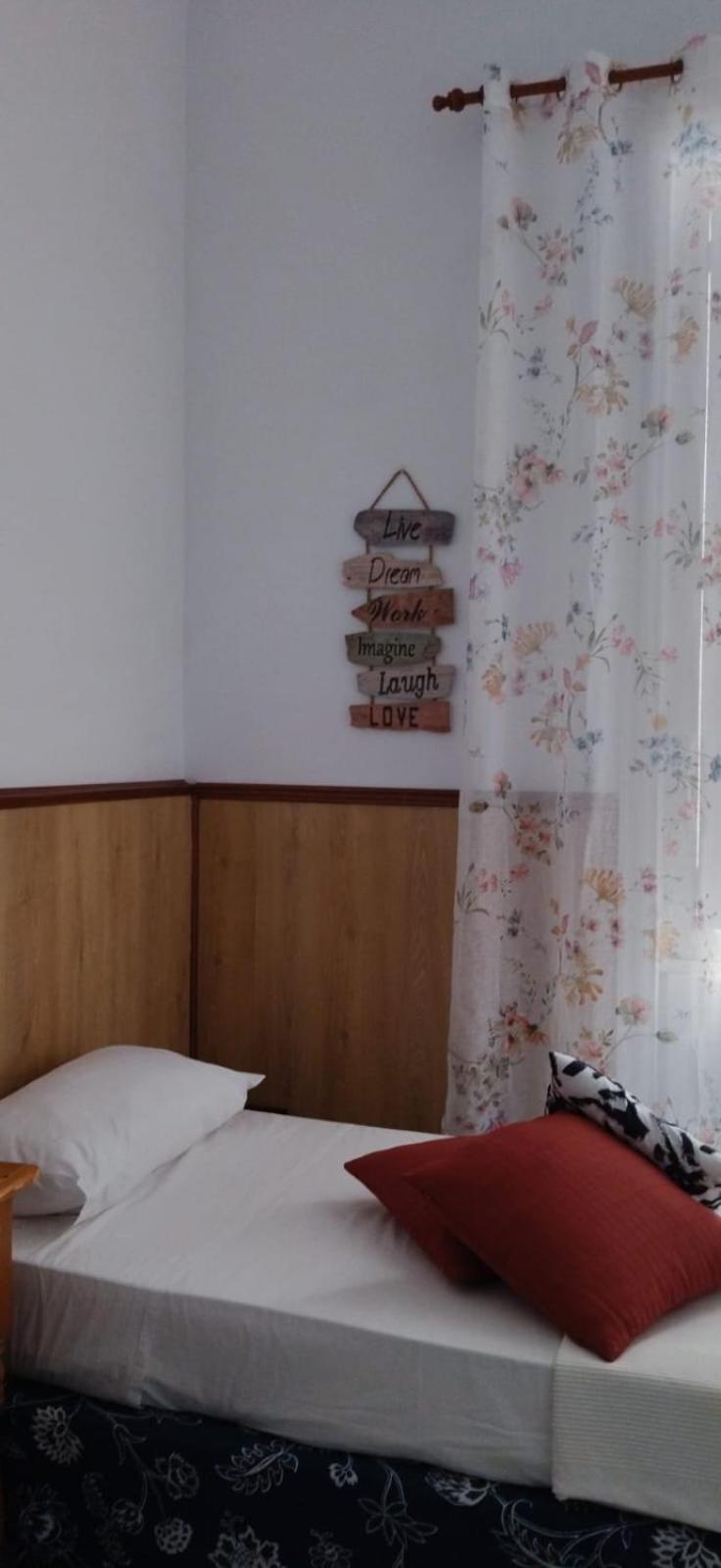 Tati Quarto em Acomodações Particulares *